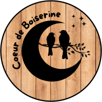 Logo rond coeur de boiserine entoure de noir